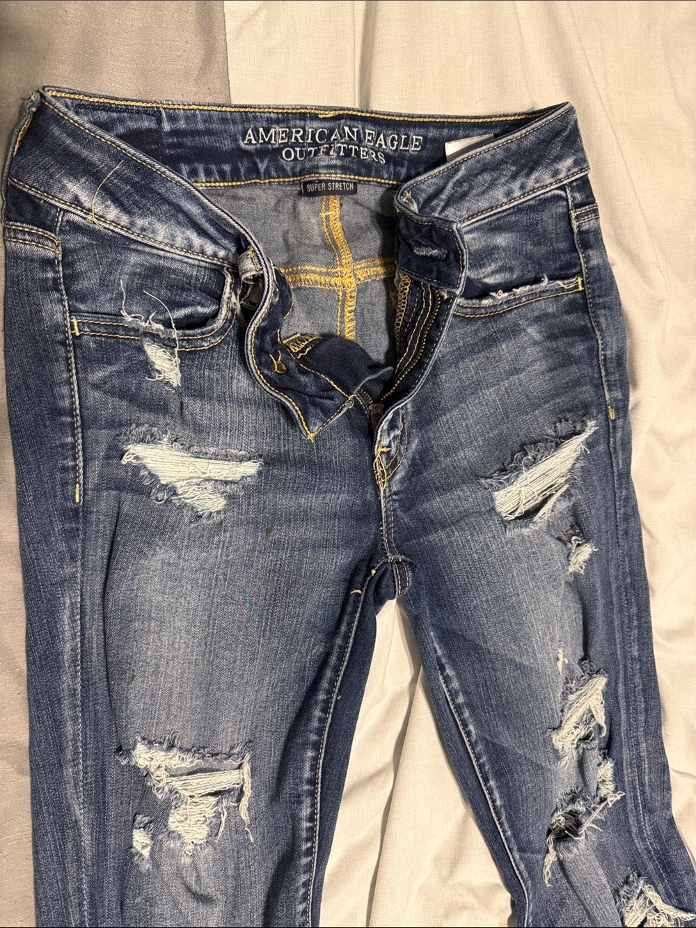 American Eagle Outfitters Distressed Skinny Jeans in Blue